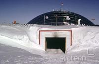  The main entrance to the former geodesic dome ramps down from the surface level. The base of the dome base was originally at the surface level of the ice cap, but the base had been slowly buried by snow and ice.